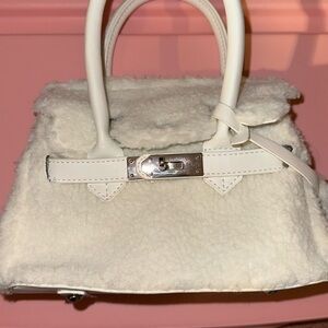 Cute little Sherpa like mini bag